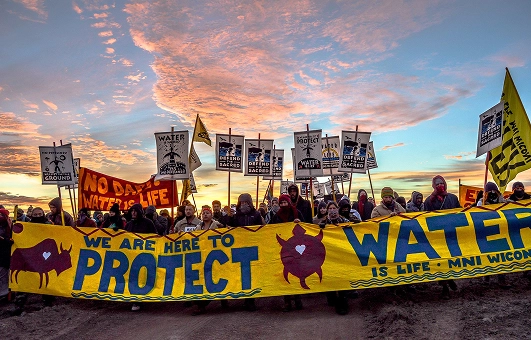 Indigenous organizers marching for land and water rights.